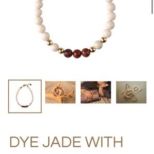 White and Red Beaded Bracelet with Gold Accents